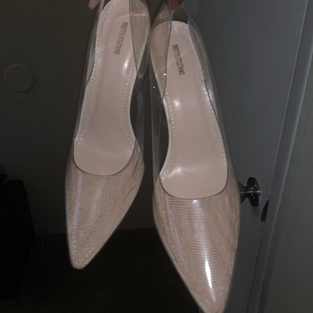 Clear court heels. Worn once. (Barely)